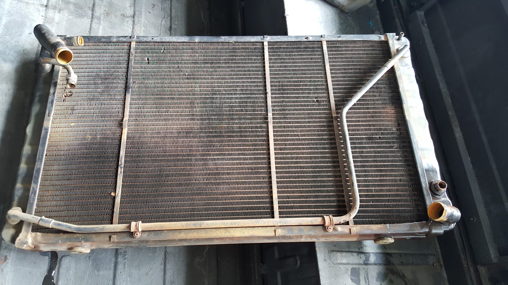 Removed radiator for re-core ad separation of the oil cooler