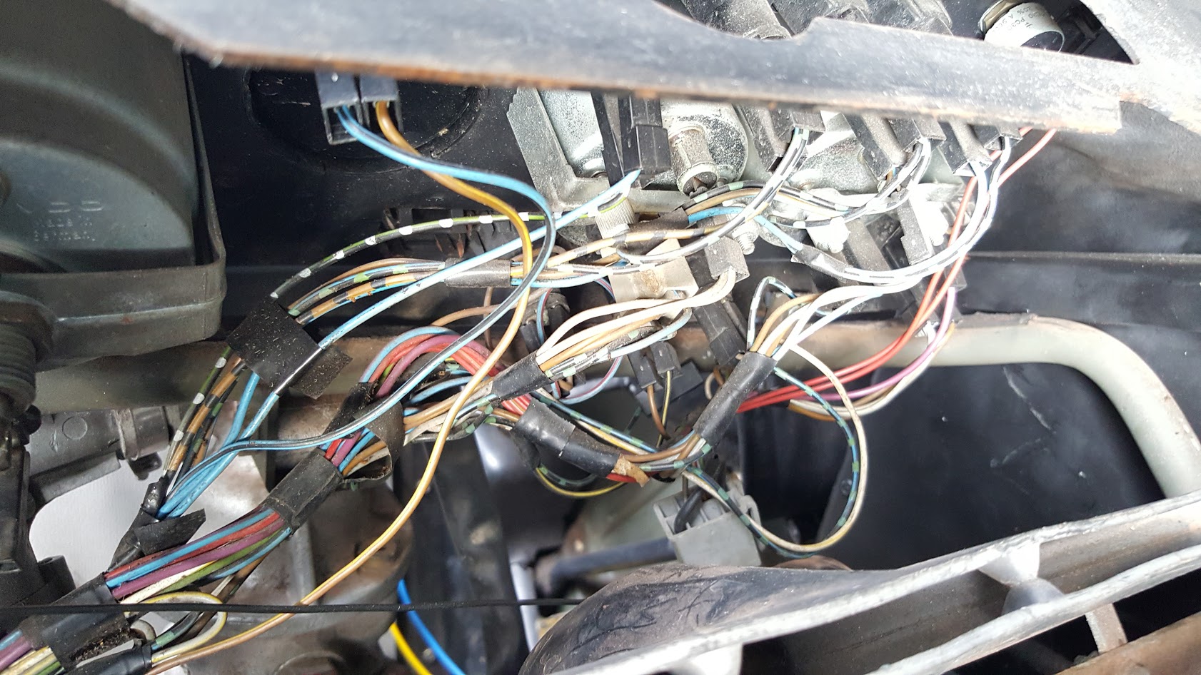 Checked wiring mess behind dash