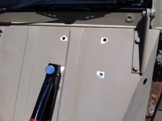 Drilled holes, painted holes and installed inserts...